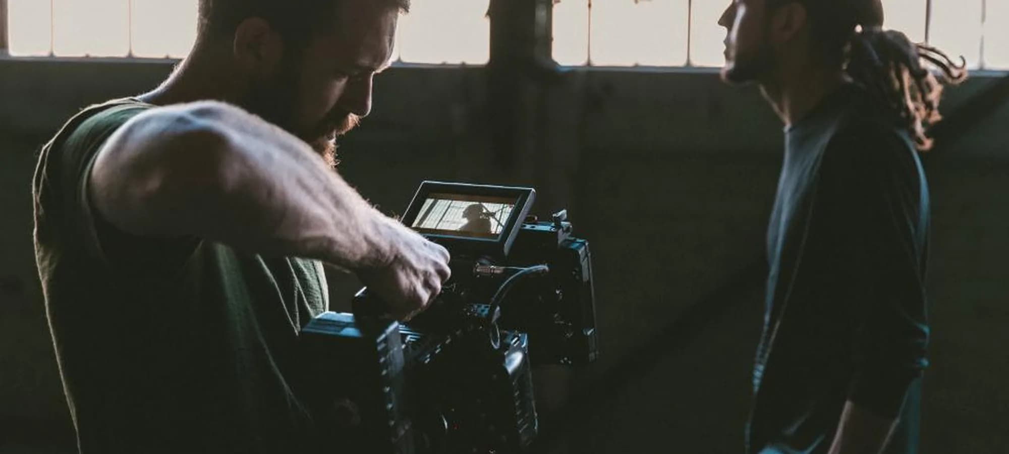 A film crew shooting on set with studio lighting